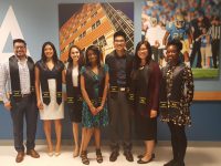 Click to show details - 10s - 11 students with their graduation sashes