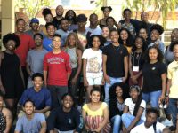 Click to show details - 10s - 14 group of students outside of campbell hall