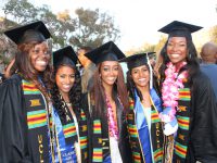 Click to show details - 10s - 5 students in caps and gowns