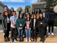 Click to show details - 20s -5 group of students standing on steps