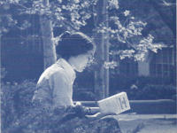Click to show details - 80s - 2 student reading outdoors
