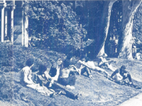 Click to show details - 80s - 3 students relaxing on the grass
