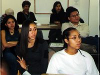 Click to show details - 90s - 13 students listening and taking notes