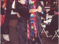 Click to show details - 90s - 9 students at commencement